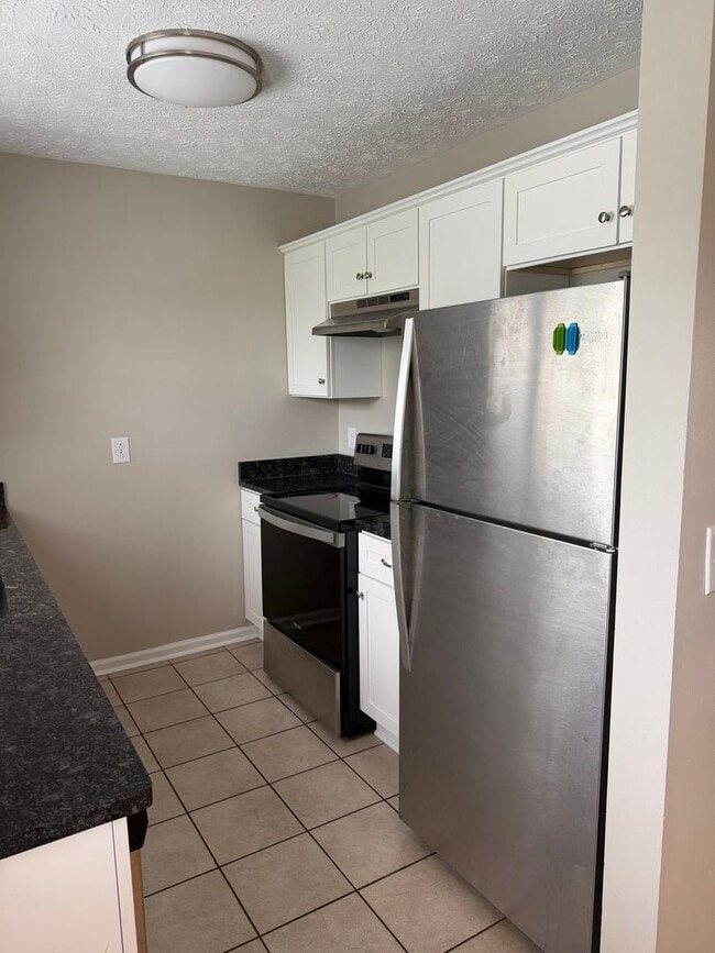 Photo - Spacious 2-Bedroom Townhouse with Garage
