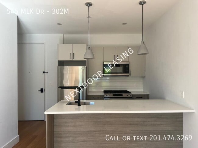 Building Photo - 545 M.L.K. Drive Unit 302M