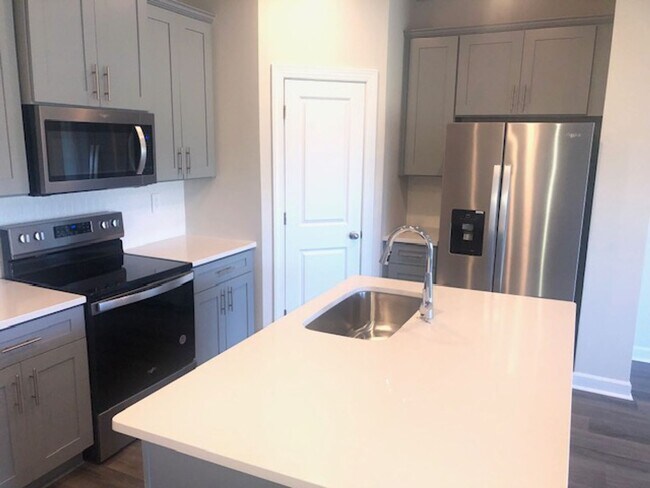 Photo - Newer Townhome with 1 Car Garage in Braemar Village! COMING SOON!