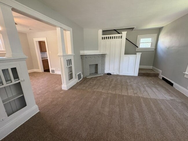 Photo - Comfortable Akron Home with Covered Front Porch, Dining Room & 2-Car Garage