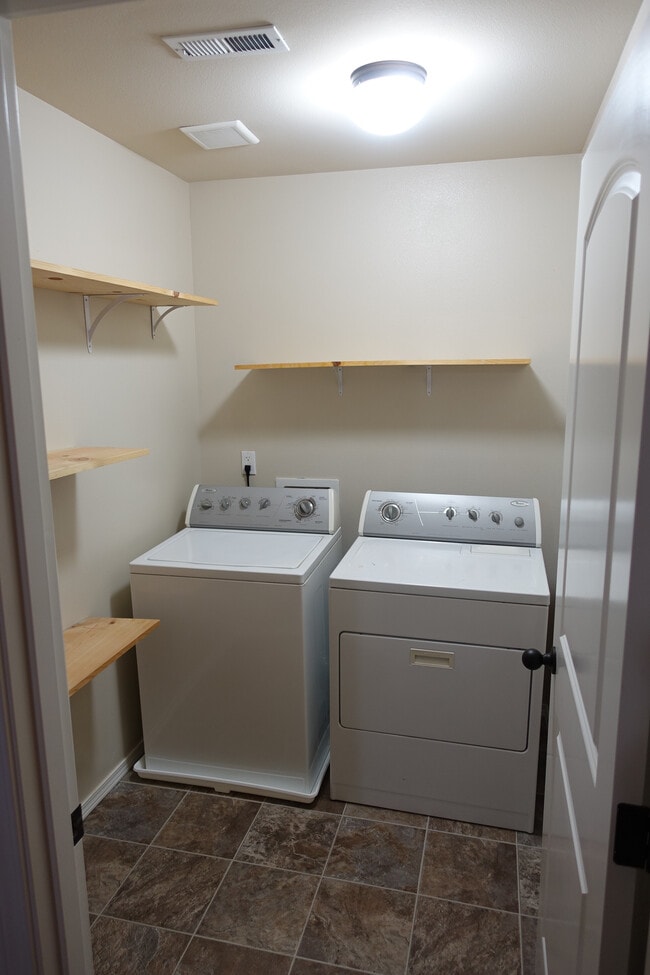 Utility Room with Washer and Dryer - 7730 181st Street East
