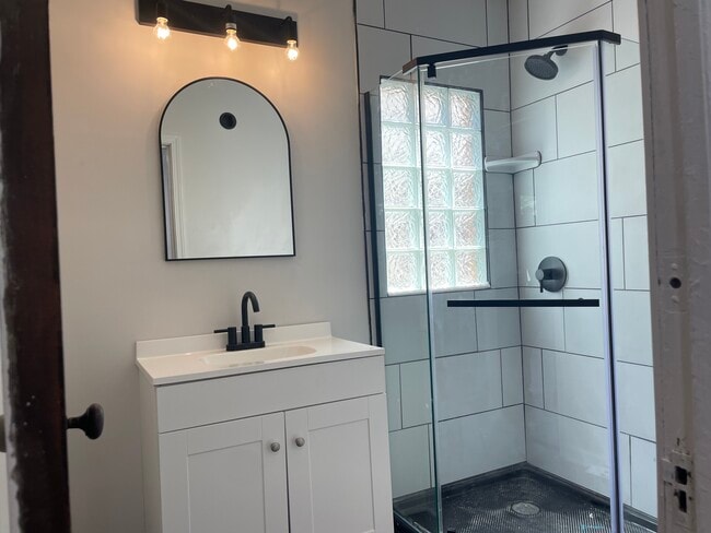 Beautiful bathroom with standup tiled shower - 57 Kirkover St Apartments Unit Lower