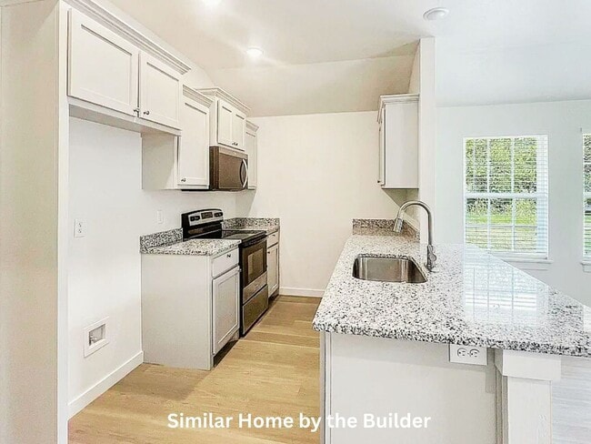 Building Photo - Fresh & New! 3 Bed Home with Stylish Interior + Fenced Yard