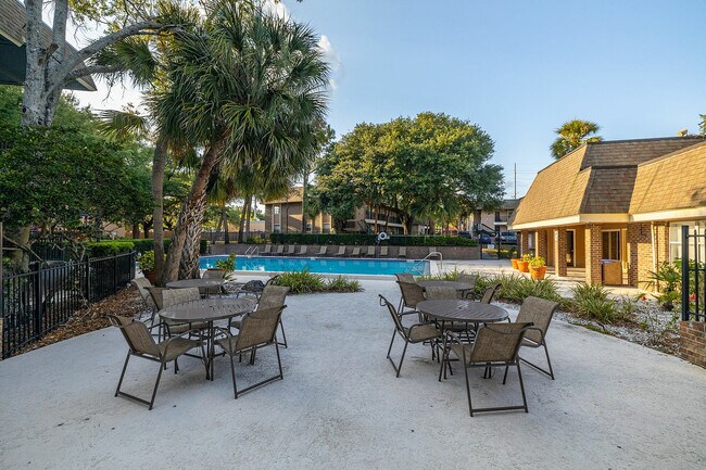 Unwind in a serene poolside setting, ideal for social gatherings and relaxation.