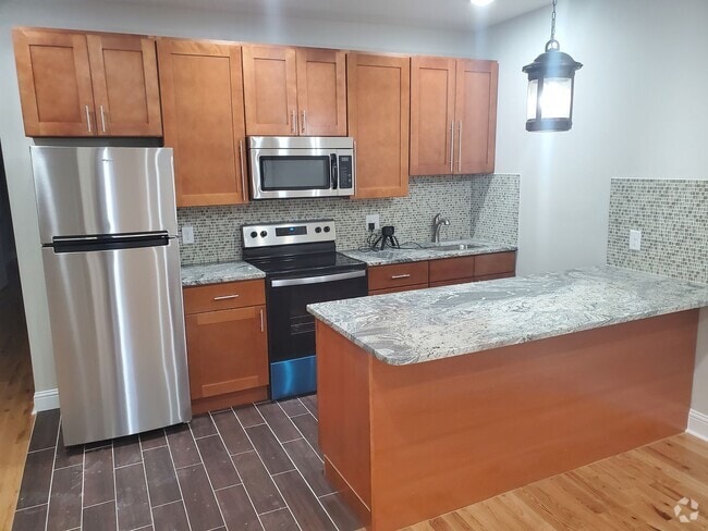 Building Photo - 6109 Spruce St Unit 1F Rental