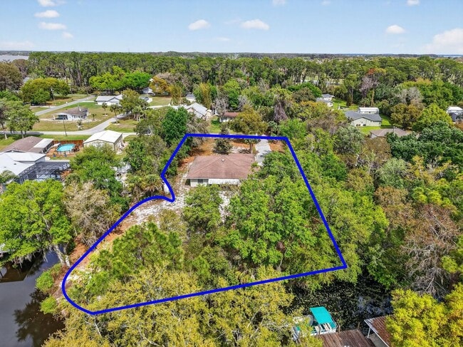 Photo - Fully Renovated Canal-Front Home on the Harris Chain of Lakes!