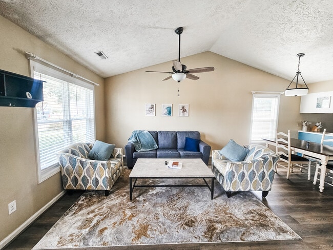Living Room with vaulted ceiling & fan - 2127 Winter Moss Ln