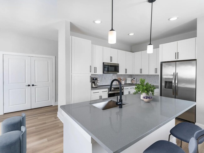 Choose your style with two distinct finish packages and enjoy a sleek ENERGY STAR stainless steel appliance package. - Modera Liberty Row