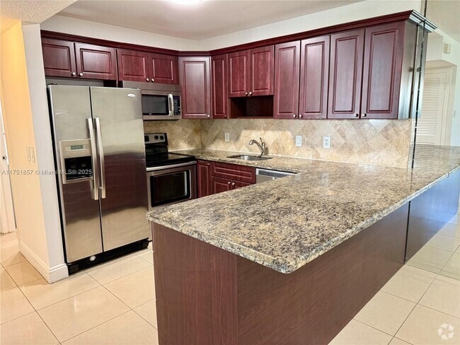 Building Photo - 22785 SW 66th Ave Unit 22785 SW 66th Avenue 103, Rental