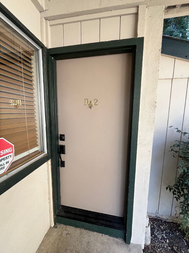 Downstairs 2 bedroom unit with parking and a patio