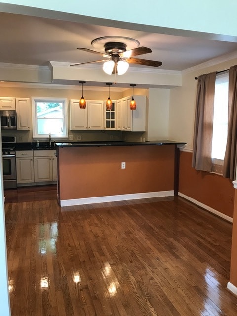 Fully equipped kitchen with eat-in bar - 9044 Rhode Island Ave