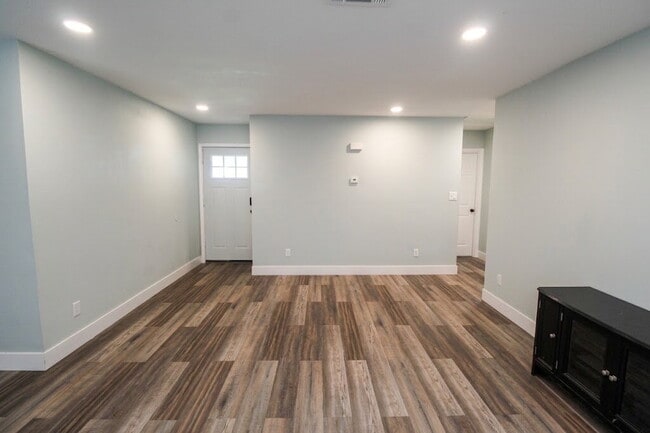 Photo - Updated West Pensacola 3BR Home with Luxury Plank Flooring, Modern Kitchen, 1-Car Garage & Large ...