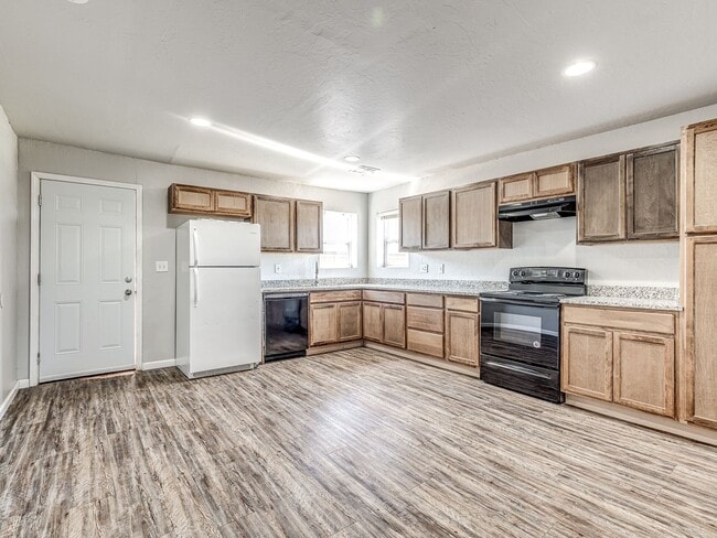 Photo - Charming Home + Balcony + Centrally Located in OKC + 3 bedrooms