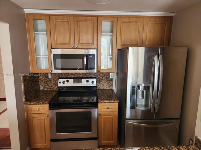 Building Photo - 7075 NW 186th St Rental