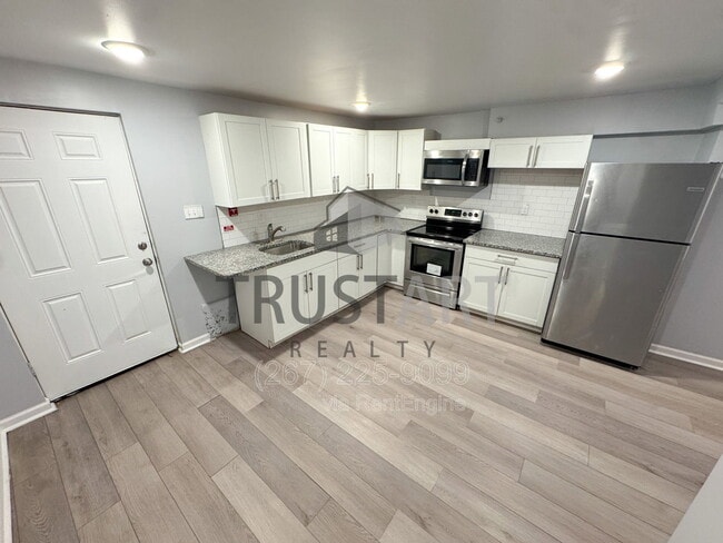 Building Photo - 5448 Springfield Ave Unit 1R