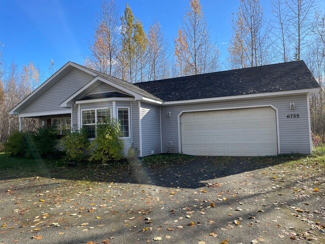 Photo - Ranch style 3bedroom/2 bathroom with an Oversized two car garage +giant carport!  Large private l...