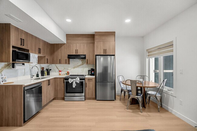 Photo - 142 Canoe Crescent SW Unit SI ID1386564P