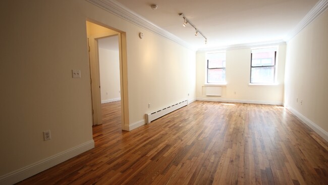 Photo - 525 W 49th St Apartment Unit 3C