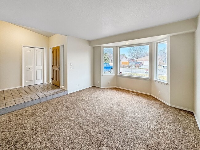 Photo - Spacious 3-Bedroom Home with 3-Car Garage, Fenced Yard & Easy Commute to Downtown Boise & BSU