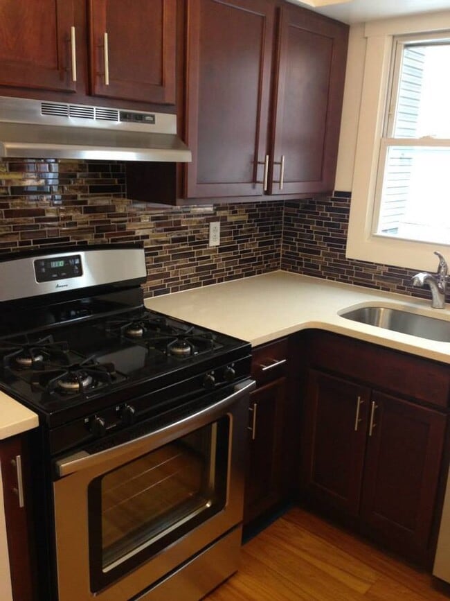 Photo - Elegant Modern Renovation. Stainless.Quart...