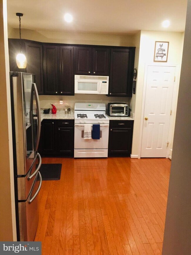 Photo - Absolutely Stunning townhome in the heart of Bristow. 3 bedroom, 2 full bathrooms and 2 half baths.