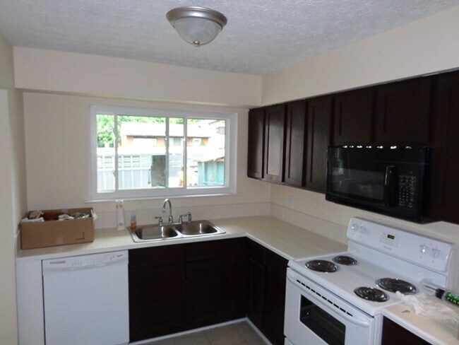 Photo - Inviting 3-Bedroom Split-Level Home with E...