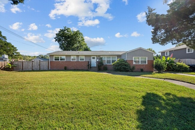 Building Photo - Spacious 4-Bedroom Home with Modern Updates