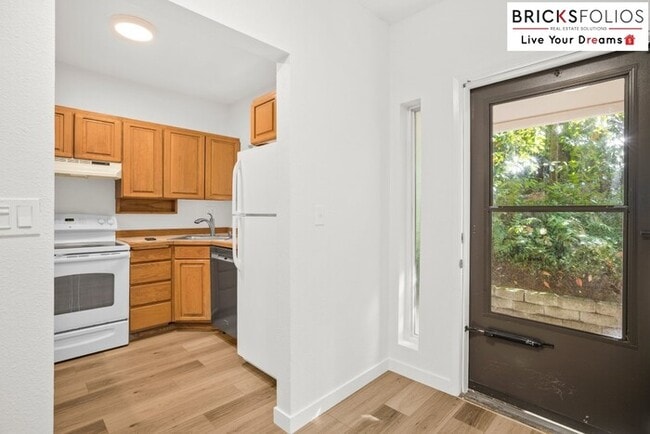 Photo - Live Steps from Microsoft | Stylish 2BR Condo with Fireplace & Parking Unit Apartment C104