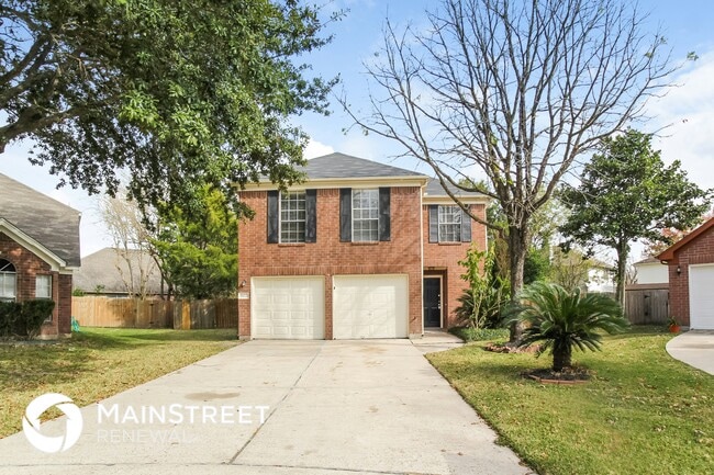 Building Photo - 8822 Woodcamp Dr