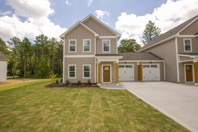 "Luxurious 3-Bed Townhouse with Granite Countertops on Juniper Lake Road!"