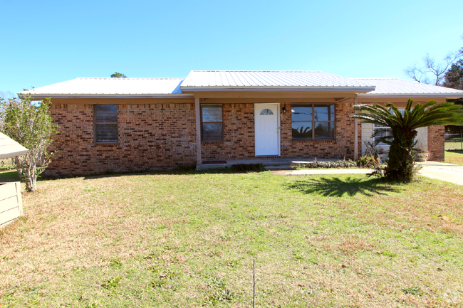 Building Photo - Charming 3-Bedroom Brick Home on Half an A...