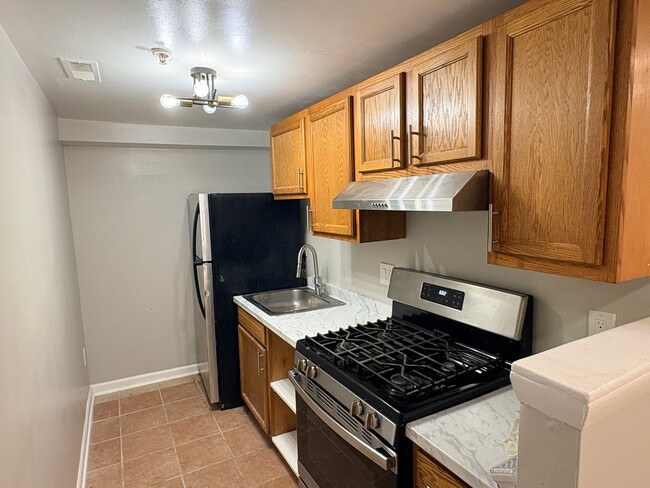 Photo - Renovated 3-Bedroom Apartment in Prime SE ... Unit B2
