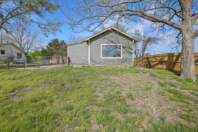 Photo - White picket fence cottage, ready to be your next home!