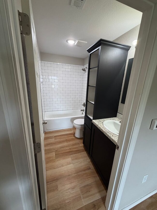 Photo - 2 BEDROOM 1 BATH HOUSE ALL ELECTRIC TILE FLOORING CENTRAL HEAT & AIR STACK WASHER/DRYER INCLUDED