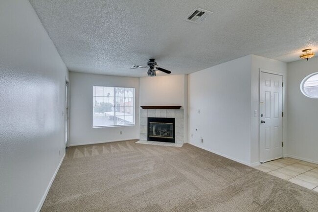 Building Photo - Charming Second-Floor Condo with Two Bedrooms and Fireplace