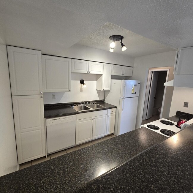 Building Photo - 3855 Montgomery Blvd NE Unit 1133