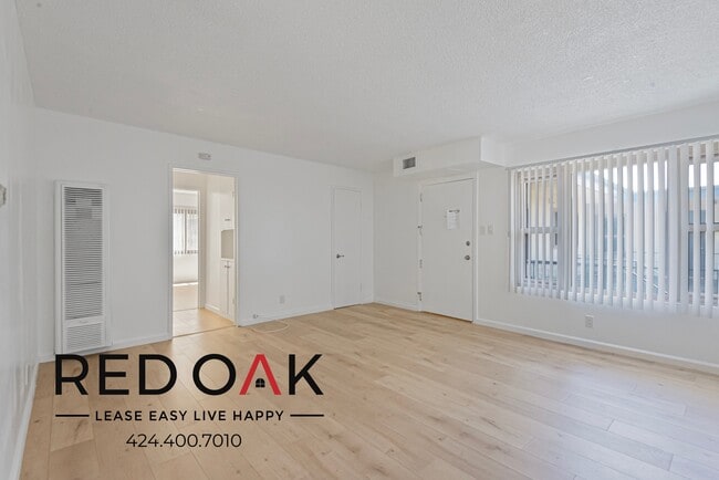 Building Photo - 8619 Belford Ave Unit 8