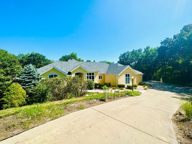 Photo - {6411} Enchanted Lake Estates + Updated Kitchen, Fresh Paint Throughout + Main Floor Primary Bed...