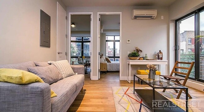 Photo - Bright 2 Bed / 1 Bath Loft-Style Residence with Multiple Balconies & Premium Amenities Unit 3A