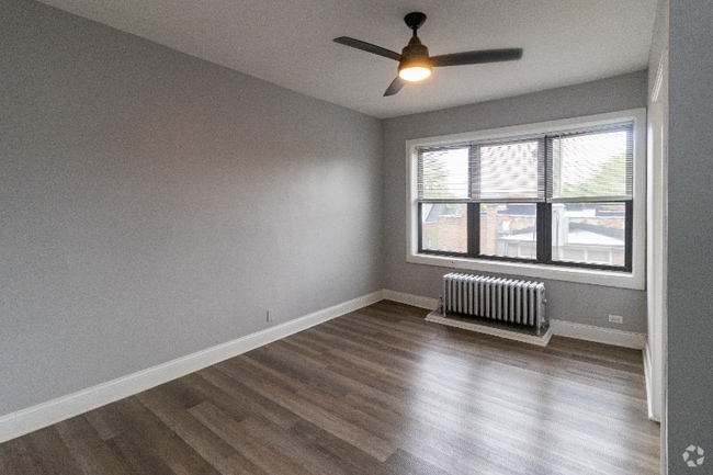 Building Photo - 6916 S Clyde Ave Unit 407 Rental