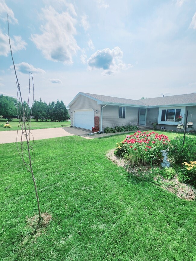Townhouse (2 bdrm with 2.5 car garage, yard, private basmnt)