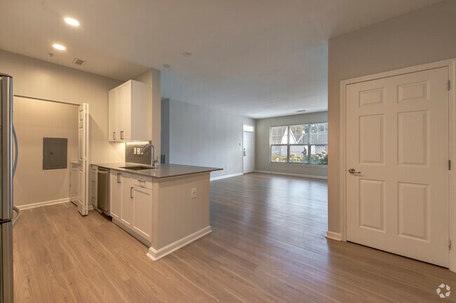 Riverwood at New Canaan - 1BD 1BA - Kitchen & Living Room