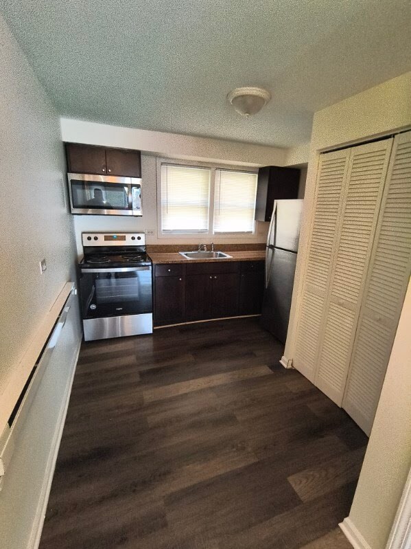 Photo - 7617 S Colfax Ave Unidad 104