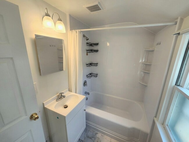 Photo - Spacious 4bd apt | Laundry hooks ups | Off street parking