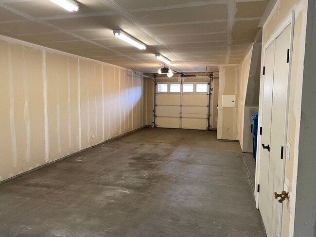 Photo - Large garage with attached spacious 2 bedroom townhome