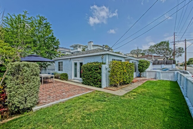 Photo - CHARMING & AIRY HOME W/ SPACIOUS FENCED YARD & LARGE 2-CAR GARAGE CLOSE TO SCHOOLS, SHOPPING & MI...