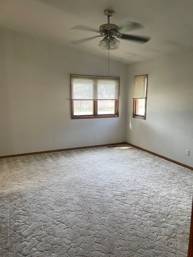 Photo - Spacious 3 Bed 3 Bath Townhome with Finished Basement & 2-Car Garage