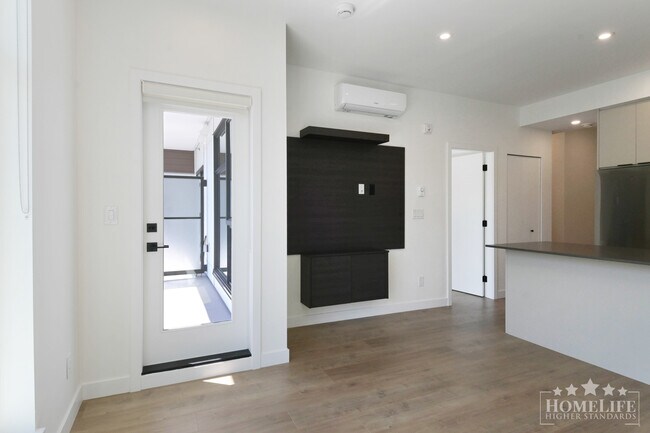 Photo - 2 Bed, 1 Bath Condo for rent in Surrey! Unit 409