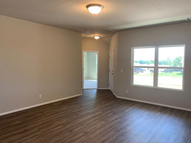 Photo - This well-designed 4-bedroom home has a split floor plan that gives the feeling of space.