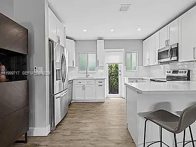 Building Photo - 808 NE 17th Way Unit 2